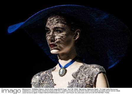 April 29, 2016 - Barcelona, Catalonia, Spain - A model walks the runway presenting a wedding dress of the Spring Summer 2017 collection during the Sonia Pena catwalk show at the Barcelona Bridal Fashion Week 2016 Barcelona Spain - ZUMAo105