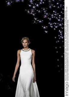 April 29, 2016 - Barcelona, Catalonia, Spain - A model walks the runway presenting a wedding dress of the Spring Summer 2017 collection during the Pronovias catwalk show at the Barcelona Bridal Fashion Week 2016 Barcelona Spain - ZUMAo105