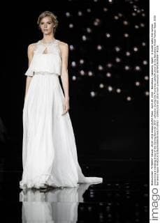 April 29, 2016 - Barcelona, Catalonia, Spain - A model walks the runway presenting a wedding dress of the Spring Summer 2017 collection during the Pronovias catwalk show at the Barcelona Bridal Fashion Week 2016 Barcelona Spain - ZUMAo105