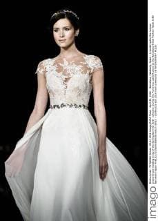 April 29, 2016 - Barcelona, Catalonia, Spain - A model walks the runway presenting a wedding dress of the Spring Summer 2017 collection during the Pronovias catwalk show at the Barcelona Bridal Fashion Week 2016 Barcelona Spain - ZUMAo105