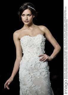 April 29, 2016 - Barcelona, Catalonia, Spain - A model walks the runway presenting a wedding dress of the Spring Summer 2017 collection during the Pronovias catwalk show at the Barcelona Bridal Fashion Week 2016 Barcelona Spain - ZUMAo105