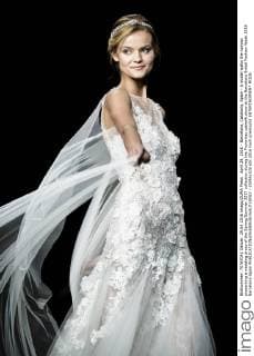 April 29, 2016 - Barcelona, Catalonia, Spain - A model walks the runway presenting a wedding dress of the Spring Summer 2017 collection during the Pronovias catwalk show at the Barcelona Bridal Fashion Week 2016 Barcelona Spain - ZUMAo105