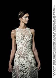 April 29, 2016 - Barcelona, Catalonia, Spain - A model walks the runway presenting a wedding dress of the Spring Summer 2017 collection during the Pronovias catwalk show at the Barcelona Bridal Fashion Week 2016 Barcelona Spain - ZUMAo105
