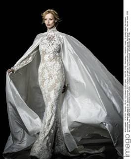 April 29, 2016 - Barcelona, Catalonia, Spain - A model walks the runway presenting a wedding dress of the Spring Summer 2017 collection during the Pronovias catwalk show at the Barcelona Bridal Fashion Week 2016 Barcelona Spain - ZUMAo105