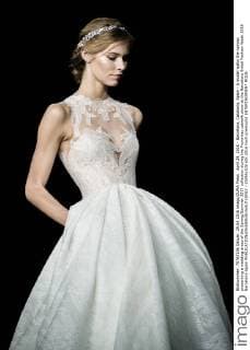 April 29, 2016 - Barcelona, Catalonia, Spain - A model walks the runway presenting a wedding dress of the Spring Summer 2017 collection during the Pronovias catwalk show at the Barcelona Bridal Fashion Week 2016 Barcelona Spain - ZUMAo105