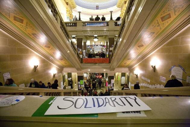 Feb 26, 2011 - Madison, Wisconsin, U.S. - Demonstrators fill the halls and rotunda at the capitol building protesting the proposed Budget Repair bill. Demonstrators have occupied the building s interior for the past 12 days protesting Governor Walker s attempt to push through the bill that would restrict collective bargaining rights for most government workers. - ZUMAhc1_