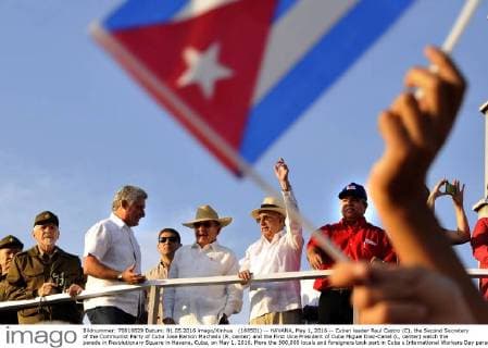 (160501) -- HAVANA, May 1, 2016 -- Cuban leader Raul Castro (C), the Second Secretary of the Communist Party of Cuba Jose Ramon Machado (R, center) and the First Vice President of Cuba Miguel Diaz-Canel (L, center) watch the parade in Revolutionary Square in Havana, Cuba, on May 1, 2016. More the 500,000 locals and foreigners took part in Cuba s International Workers Day parade here on Sunday, also celebrating the 90th birthday of Cuban revolutionary leader Fidel Castro. ) (jp) CUBA-HAVANA-MAY DAY-PARADE JOAQUINxHERNANDEZ 