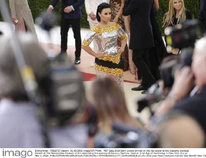 MET Gala 2016 Demi Lovato arrives on the red carpet at the Costume Institute Benefit at The Metropolitan Museum of Art celebrating the opening of Manus x Machina: Fashion in an Age of Technology in New York City on May 2, 2016.  NYP2016050212171 JOHNxANGELILLO