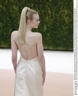 MET Gala 2016 Elle Fanning arrives on the red carpet at the Costume Institute Benefit at The Metropolitan Museum of Art celebrating the opening of Manus x Machina: Fashion in an Age of Technology in New York City on May 2, 2016.  NYP2016050212184 JOHNxANGELILLO