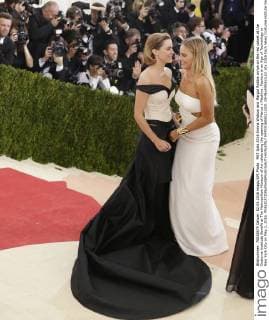 MET Gala 2016 Emma Watson and Margot Robbie arrive on the red carpet at the Costume Institute Benefit at The Metropolitan Museum of Art celebrating the opening of Manus x Machina: Fashion in an Age of Technology in New York City on May 2, 2016.  NYP2016050212201 JOHNxANGELILLO