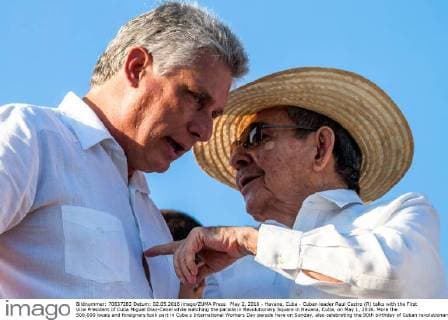 May 2, 2016 - Havana, Cuba - Cuban leader Raul Castro (R) talks with the First Vice President of Cuba Miguel Diaz-Canel while watching the parade in Revolutionary Square in Havana, Cuba, on May 1, 2016. More the 500,000 locals and foreigners took part in Cuba s International Workers Day parade here on Sunday, also celebrating the 90th birthday of Cuban revolutionary leader Fidel Castro. Havana Cuba  - ZUMAn230