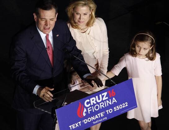 Republican presidential hopeful Ted Cruz, delivers his concession speech to supporters while wife Heidi (C) and daughter Catherine look on at an election night rally in downtown Indianapolis, Indiana on May 3, 2016. After loosing the all-important Hoosier state, Cruz bowed out of the Republican presidential primary.  FPX2016050395 FRANKxPOLICH