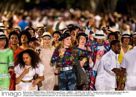 (160504) -- HAVANA, May 3, 2016 -- Models perform traditional Cuban dance after the debut of Karl Lagerfeld s Cruise line for Chanel at the Paseo del Prado street in Havana, Cuba, May 3, 2016. )(dh) CUBA-HAVANA-CHANEL CRUISE LiuxBin 