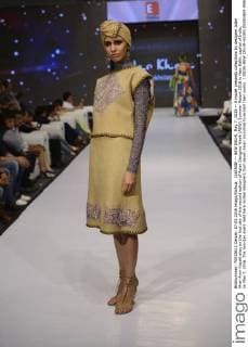 (160508) -- NEW DELHI, May 7, 2016 -- A model presents collections by designer Aidar Khan from Kazakhstan on the first day of the second edition of Asian Designer Week (ADW) Summer Resort 2016 in New Delhi, capital of India, on May 7, 2016. The two-day event held here invited designers from seven Asian countries to exhibit their works. ) INDIA-NEW DELHI-ASIAN DESIGNER WEEK Stringer 