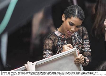 London, UK. 9 May 2016. Actress Alexandra Shipp (Ororo Monroe Storm) interacts with fans at the X-Men: Apocalypse - Global Fan Screening at the BFI Imax cinema in London. X-Men: Apocalypse, Global Fan Screening, London, UK 