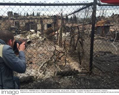 May 9, 2016 - Canada - Na-wildfire-demolition9.Fort McMurray s Abasand neighbourhood was also hit hard..CREDIT Canada  - ZUMAt14_