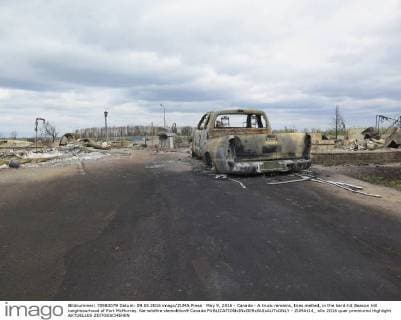 May 9, 2016 - Canada - A truck remains, tires melted, in the hard-hit Beacon Hill neighbourhood of Fort McMurray. Na-wildfire-demolition9 Canada  - ZUMAt14_