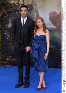 English actor and comedian Sacha Baron Cohen and his wife, Australian actress Isla Fisher, attending the Alice Through the Looking Glass European premiere, held at London s Odeon Leicester Square. MAY 10th 2016  JWNx161358