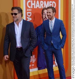 Cast members Russell Crowe (L) and Ryan Gosling attend the premiere of the motion picture comedy thriller The Nice Guys at the TCL Chinese Theatre in the Hollywood section of Los Angeles on May 10, 2016. Storyline: A private eye investigates the apparent suicide of a fading porn star in 1970s Los Angeles and uncovers a conspiracy.  LAP2016051011 JIMxRUYMEN