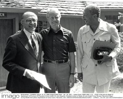 Jan. 26, 2011 - Camp David, MARYLAND, U.S. - (FILE) A file picture dated 07 September 1978 shows US President Jimmy Carter (C) with Egyptian President Anwar al Sadat (R) and Israeli Prime Minister Menachem Begin during Middle East peace negotiations at Camp David, Maryland, USA. - ZUMAl17_