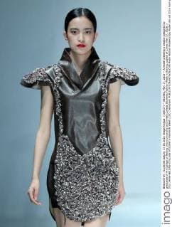 (160517) -- BEIJING, May 17, 2016 -- A model presents a creation designed by graduates of Art College of Beijing Union University at Chinese College Students Fashion Week in Beijing, capital of China, May 17, 2016. ) (lfj) CHINA-BEIJING-COLLEGE STUDENTS FASHION WEEK (CN) ChenxJianli 