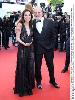 Michelle Yeoh (L) and Terry Gilliam arrive on the red carpet before the screening of the film Julieta at the 69th annual Cannes International Film Festival in Cannes, France on May 17, 2016.  CAN20160517847 DAVIDxSILPA