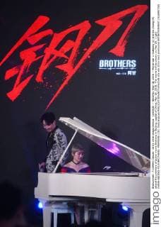 (160518) -- BEIJING, May 18, 2016 -- Movie star Li Xuedong (L) and Xia Zitong (R) attend the premiere of action movie Brothers in Beijing, capital of China, May 18, 2016. The movie will be shown on May 20. ) (gtt) CHINA-BEIJING-FILM BROTHERS -PREMIERE (CN) JinxLiangkuai 