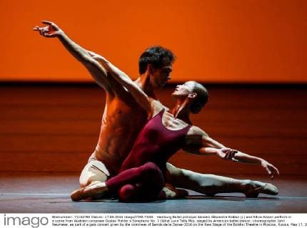 Hamburg Ballet principal dancers Alexandre Riabko (L) and Silvia Azzoni perform in a scene from Austrian composer Gustav Mahler s Symphony No. 3 (What Love Tells Me), staged by American ballet dancer, choreographer John Neumeier, as part of a gala concert given by the nominees of Benois de la Danse-2016 on the New Stage of the Bolshoi Theatre in Moscow, Russia, May 17, 2016. Sergei Bobylev TASS  TS023803