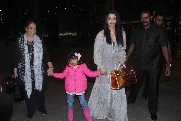 MUMBAI, INDIA - MAY 18: Bollywood actor Aishwarya Rai Bachchan with her daughter Aaradhya Bachchan and mother Brinda Rai, returning from Cannes, France, at airport, on May 18, 2016 in Mumbai, India. (Photo by Pramod Thakur Hindustan Times ) Bollywood Celebs At Mumbai Airport