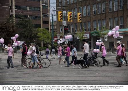 May 21, 2016 - Toronto, Ontario, Canada - A LGBT+ non-profit movement originating in Singapore demonstration in Downtown Toronto around Chinatown area. Around 100 supporters of PinkDot Toronto gathered the march. Toronto Canada - ZUMAd114