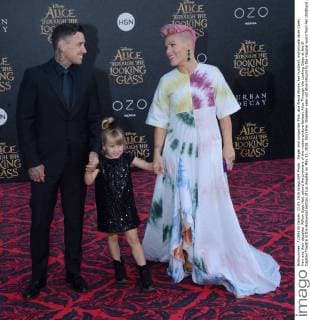 Singer and songwriter Pink, aka Alecia Moore, her husband, motorcycle racer Carey Hart and their daughter Willow Sage Hart attend the premiere of the motion picture fantasy Alice Through the Looking Glass at the El Capitan Theatre in the Hollywood section of Los Angeles on May 23, 2016. Storyline: Nineteen-year-old Alice returns to the magical world from her childhood adventure, where she reunites with her old friends and learns of her true destiny: to end the Red Queen s reign of terror.  LAP2016052306 JIMxRUYMEN