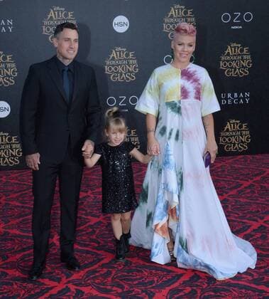 Singer and songwriter Pink, aka Alecia Moore, her husband, motorcycle racer Carey Hart and their daughter Willow Sage Hart attend the premiere of the motion picture fantasy Alice Through the Looking Glass at the El Capitan Theatre in the Hollywood section of Los Angeles on May 23, 2016. Storyline: Nineteen-year-old Alice returns to the magical world from her childhood adventure, where she reunites with her old friends and learns of her true destiny: to end the Red Queen s reign of terror.  LAP2016052307 JIMxRUYMEN