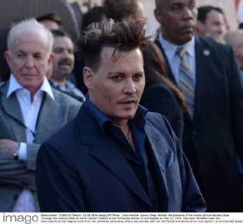 Cast member Johnny Depp attends the premiere of the motion picture fantasy Alice Through the Looking Glass at the El Capitan Theatre in the Hollywood section of Los Angeles on May 23, 2016. Storyline: Nineteen-year-old Alice returns to the magical world from her childhood adventure, where she reunites with her old friends and learns of her true destiny: to end the Red Queen s reign of terror.  LAP2016052301 JIMxRUYMEN