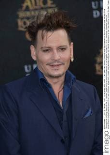 Cast member Johnny Depp attends the premiere of the motion picture fantasy Alice Through the Looking Glass at the El Capitan Theatre in the Hollywood section of Los Angeles on May 23, 2016. Storyline: Nineteen-year-old Alice returns to the magical world from her childhood adventure, where she reunites with her old friends and learns of her true destiny: to end the Red Queen s reign of terror.  LAP2016052303 JIMxRUYMEN