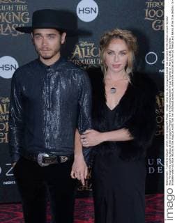 Singer Zella Day (L) and guest attend the premiere of the motion picture fantasy Alice Through the Looking Glass at the El Capitan Theatre in the Hollywood section of Los Angeles on May 23, 2016. Storyline: Nineteen-year-old Alice returns to the magical world from her childhood adventure, where she reunites with her old friends and learns of her true destiny: to end the Red Queen s reign of terror.  LAP2016052333 JIMxRUYMEN