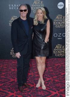 Actor Peter Fonda and Margaret DeVogelaere attend the premiere of the motion picture fantasy Alice Through the Looking Glass at the El Capitan Theatre in the Hollywood section of Los Angeles on May 23, 2016. Storyline: Nineteen-year-old Alice returns to the magical world from her childhood adventure, where she reunites with her old friends and learns of her true destiny: to end the Red Queen s reign of terror.  LAP2016052336 JIMxRUYMEN