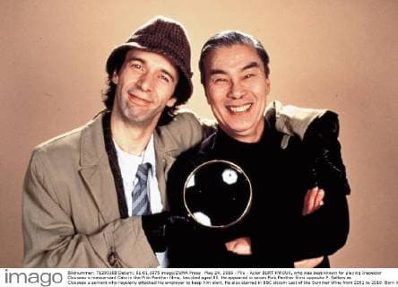 May 24, 2016 - File - Actor BURT KWOUK, who was best known for playing Inspector Clouseau s manservant Cato in the Pink Panther films, has died aged 85. He appeared in seven Pink Panther films opposite P. Sellers as Clouseau s servant who regularly attacked his employer to keep him alert. He also starred in BBC sitcom Last of the Summer Wine from 2002 to 2010. Born in Manchester but raised in Shanghai, the actor was awarded an OBE in the 2011 New Year Honour List. Pictured: June 15, 1993 - Son Of The Pink Panther With 1993, Roberto Benigni, Blake Edwards, Burt Kwouk. London United Kingdom  - ZUMArx3_