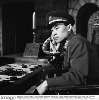 May 24, 2016 - London, England, United Kingdom - May 24, 2016 - File - Actor BURT KWOUK, who was best known for playing Inspector Clouseau s manservant Cato in the Pink Panther films, has died aged 85. He appeared in seven Pink Panther films opposite P. Sellers as Clouseau s servant who regularly attacked his employer to keep him alert. He also starred in BBC sitcom Last of the Summer Wine from 2002 to 2010. Born in Manchester but raised in Shanghai, the actor was awarded an OBE in the 2011 New Year Honour List. Pictured: June 15, 1962 - .. Man of the World - The Frontier - Burt Kwouk and Alfred Burke. TV stills London United Kingdom - ZUMAz90_