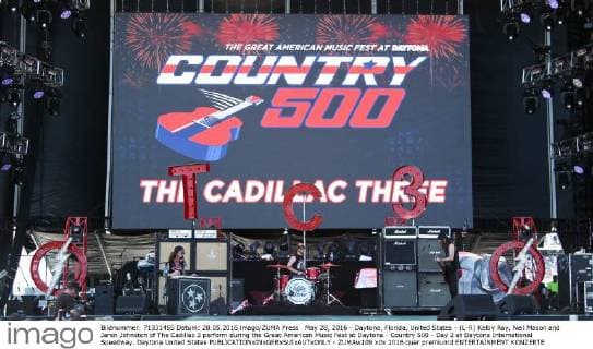 May 28, 2016 - Daytona, Florida, United States - (L-R) Kelby Ray, Neil Mason and Jaren Johnston of The Cadillac 3 perform during the Great American Music Fest at Daytona - Country 500 - Day 2 at Daytona International Speedway. Daytona United States - ZUMAw109