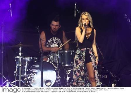 May 28, 2016 - Daytona, Florida, United States - Brooke Eden (R) performs during the Great American Music Fest at Daytona - Country 500 - Day 2 at Daytona International Speedway. Daytona United States - ZUMAw109