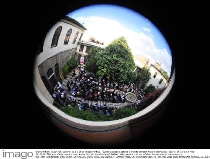 Syrian audience attend a charity concert held in Damascus, capital of Syria on May 28, 2016. The aim of the concert was raising fund for the displaced Syrians, who were forced out of their homes due to the country s five-year-old conflict. )(cl) SYRIA-DAMASCUS-FUND-RAISING-CONCERT Ammar 