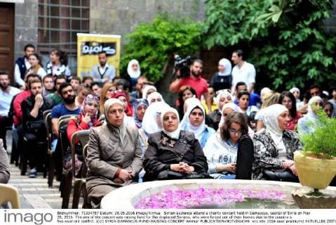 Syrian audience attend a charity concert held in Damascus, capital of Syria on May 28, 2016. The aim of the concert was raising fund for the displaced Syrians, who were forced out of their homes due to the country s five-year-old conflict. )(cl) SYRIA-DAMASCUS-FUND-RAISING-CONCERT Ammar 