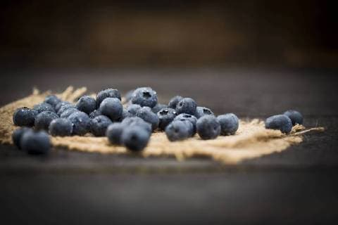 Blueberries on jute and wood  MAEF011466