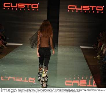 A model presents a beachwear creation by Custo Barcelona fashion designers during the Miami Fashion Week at the Ice Palace, Miami, Florida, June 3, 2016.  MIA20160603324 GARYxIxROTHSTEIN