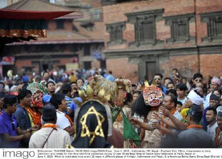 June 4, 2016 - Kathmandu, NP, Nepal - Prashant Mali, 23yrs, impersonate as deity Vaishnavi carry sheep for the ritual sacrificial procession during 12 year Shree Bagh Bhairab Dance Jatra Celebrated at Patan, Nepal on June 4, 2016. Which is celebrated once every 12 years in different places of Kirtipur, Kathmandu and Patan. It is known as Barha Barse Shree Bagh Bhairab Jatra in local Nepali language. Kathmandu Nepal  - ZUMAn230