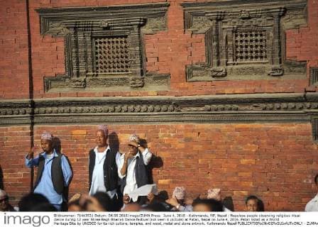 June 4, 2016 - Kathmandu, NP, Nepal - Nepalese people observing religious ritual dance during 12 year Shree Bagh Bhairab Dance festival (not seen in picture) at Patan, Nepal on June 4, 2016. Patan listed as a World Heritage Site by UNESCO for its rich culture, temples, and wood, metal and stone artwork. Kathmandu Nepal  - ZUMAn230