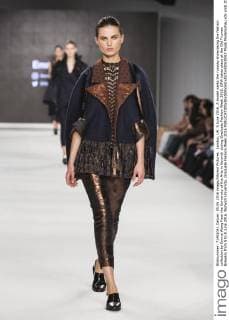 London, UK. 5 June 2016. A model walks the runway showcasing the fashion collection by Emma Wang from the University of the Arts in Norwich during Graduate Fashion Week 2016. GFW takes place at the Old Truman Brewery from 5 to 8 June 2016. Norwich University, Graduate Fashion Week 2016 