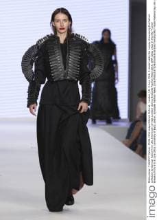 London, UK. 5 June 2016. A model walks the runway showcasing the fashion collection by Samuel Kaiser from UEL (University of East London) during Graduate Fashion Week 2016. GFW takes place at the Old Truman Brewery from 5 to 8 June 2016. University of East London, Graduate Fashion Week 2016 