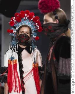 London, UK. 5 June 2016. A model walks the runway showcasing the fashion collection by Wenyue Zhang from Northumbria University during Graduate Fashion Week 2016. GFW takes place at the Old Truman Brewery from 5 to 8 June 2016. Northumbria University, Graduate Fashion Week 2016 