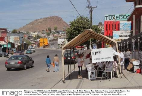 June 5, 2016 - Tijuana, Baja California, Mexico - June 5, 2016, Tijuana, Baja California, Mexico_ A large canopy covers a polling place on a busy avenue in the working class Florido area of southeastern Tijuana. Mandatory Photo Credit: Photo by Tijuana Mexico - ZUMAs44_